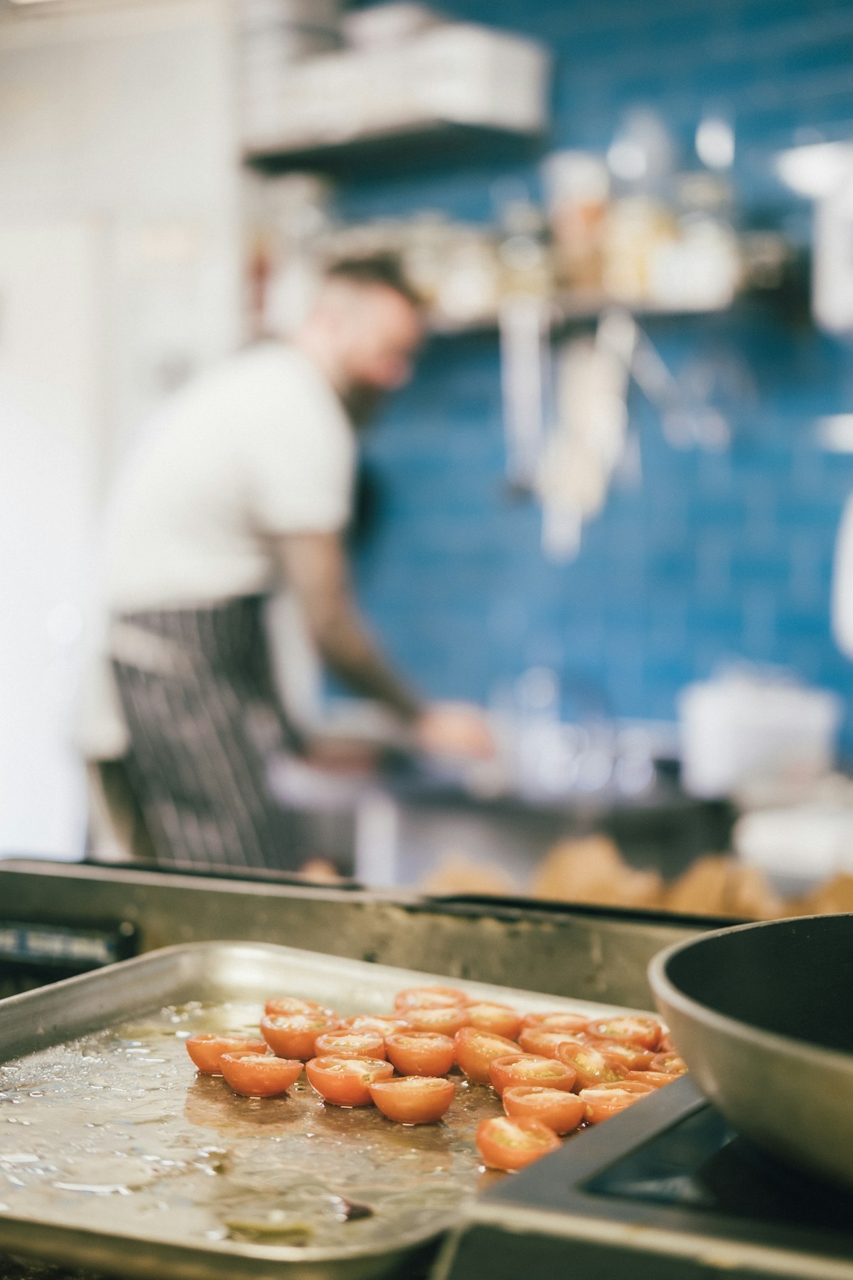 Busy commercial hotel kitchen producing organic food waste